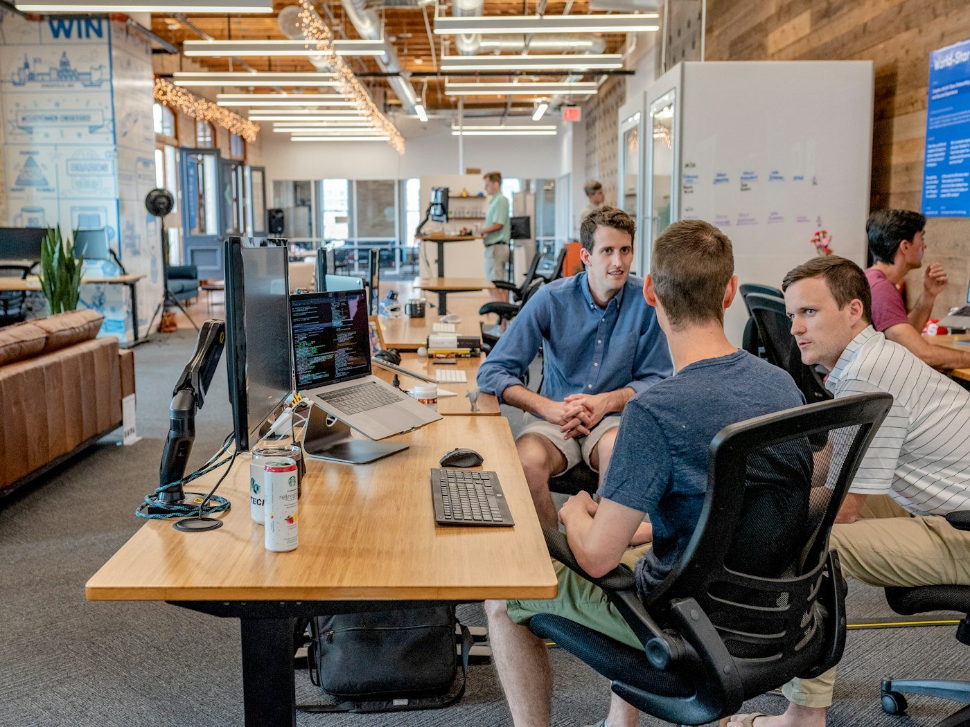 A group sharing ideas around a table during a planning session